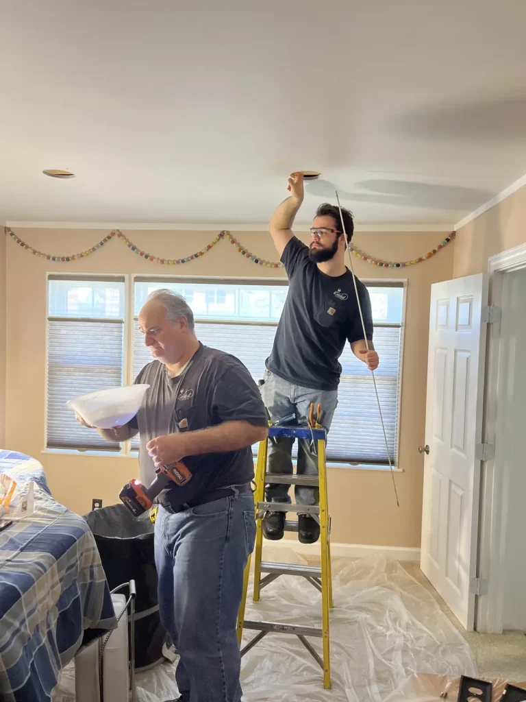 iconduit technicians installing lighting